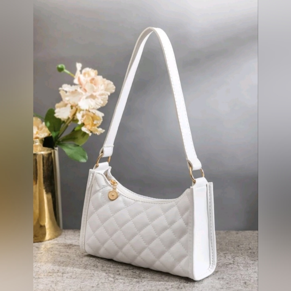 Small quilted faux leather baguette shoulder bag